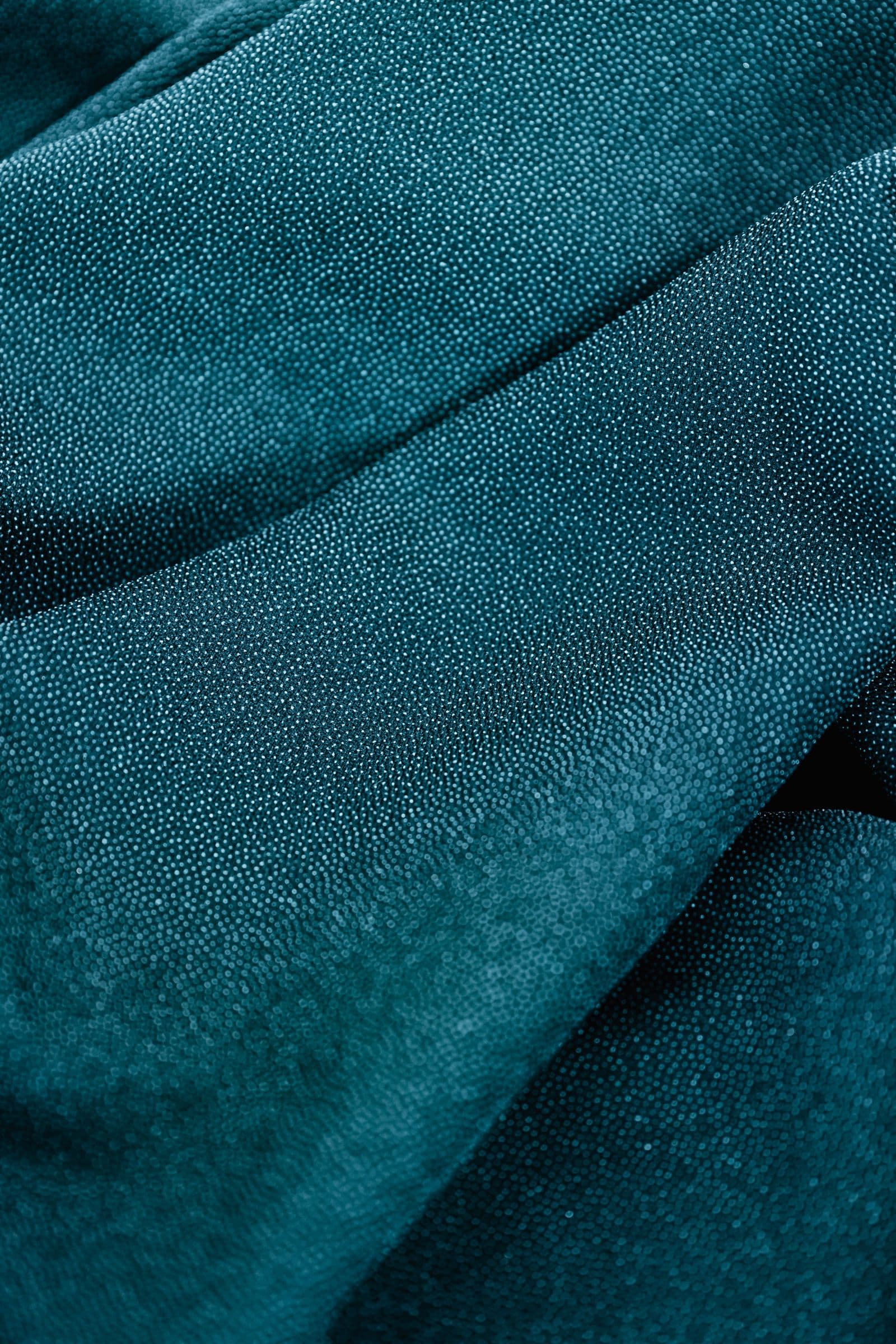 Close view of folded blue fabric