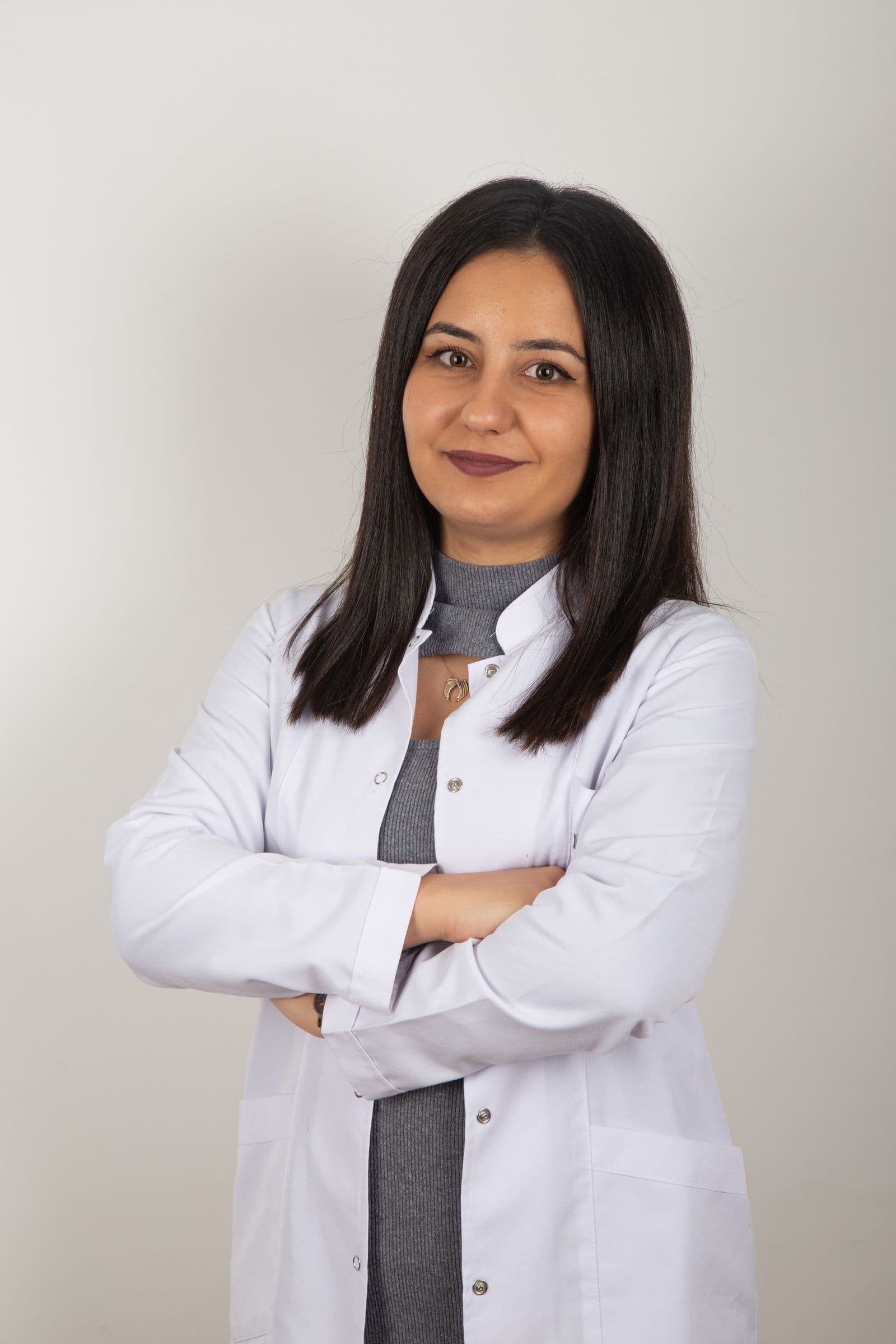 Model wearing a plain white coat